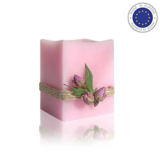 Close-up of Aromatherapy Rose Blossom Essence Candle in elegant glass container